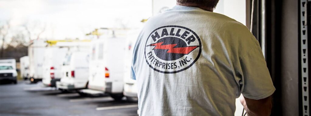 Haller Enterprises logo on technician uniform