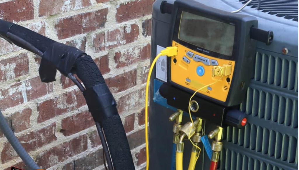 A machine that charges a central air conditioner with freon, a refrigerant