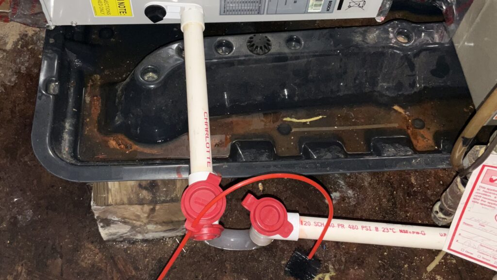 An example of drain line clogs in Pennsylvania air conditioners serviced by Haller is shown