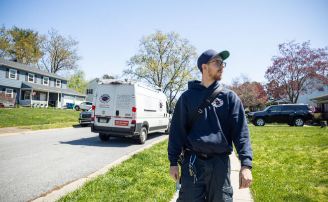 Technician on residential street in Behthlehem Pennsylvania