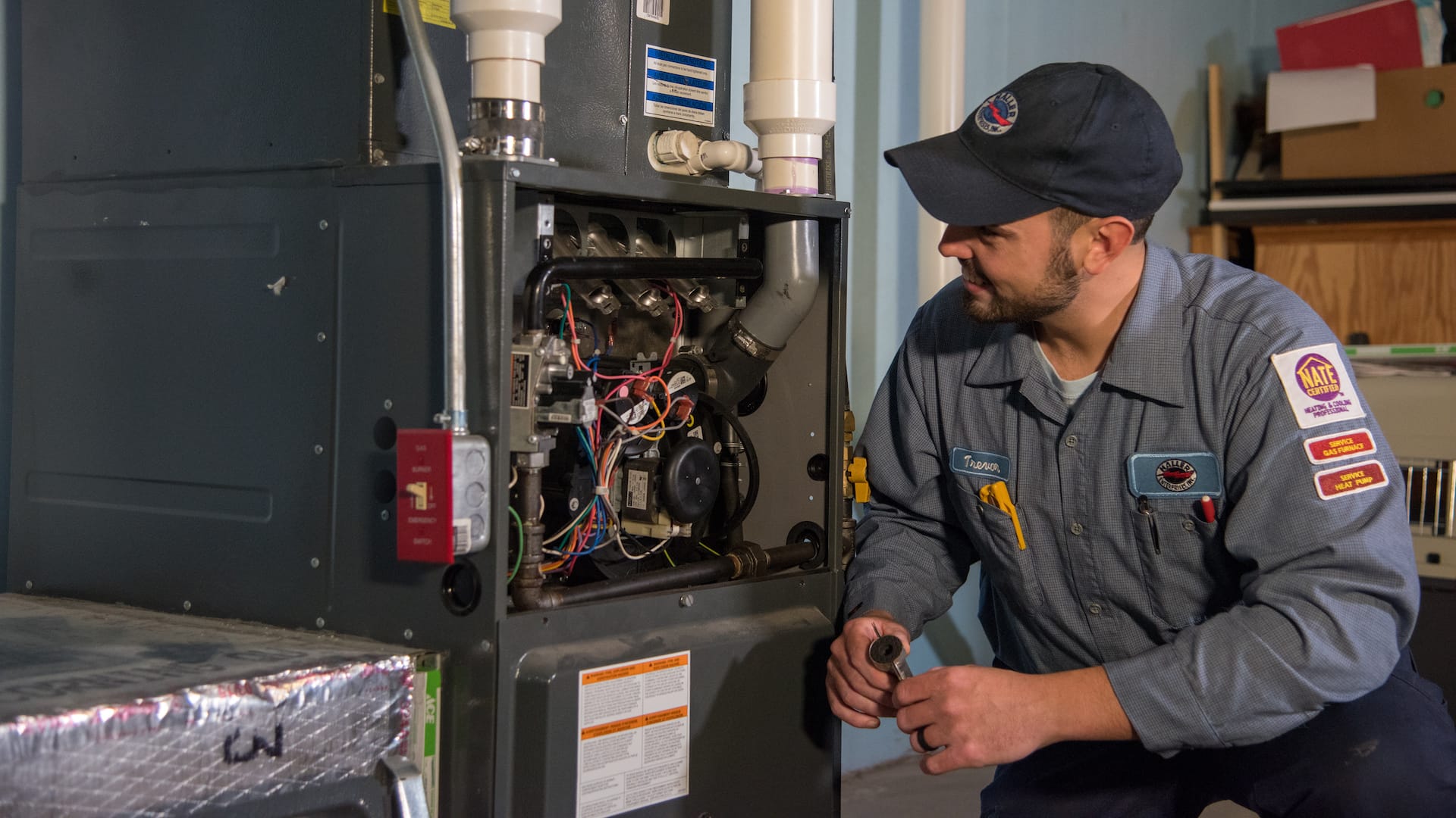 Technician Fixing an HVAC Unit