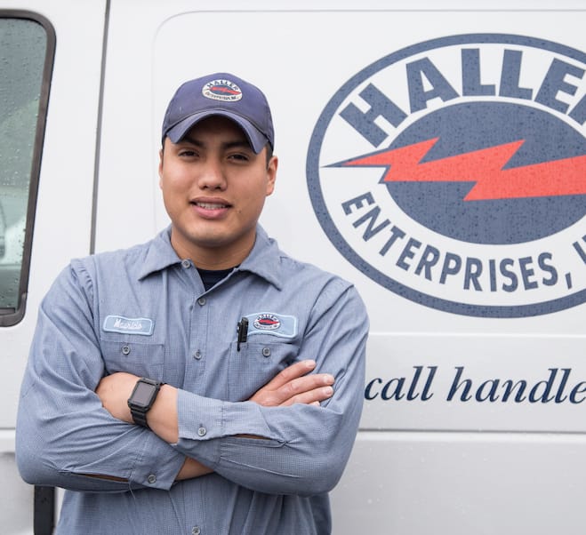 Haller Plumber Standing Outside Work Van