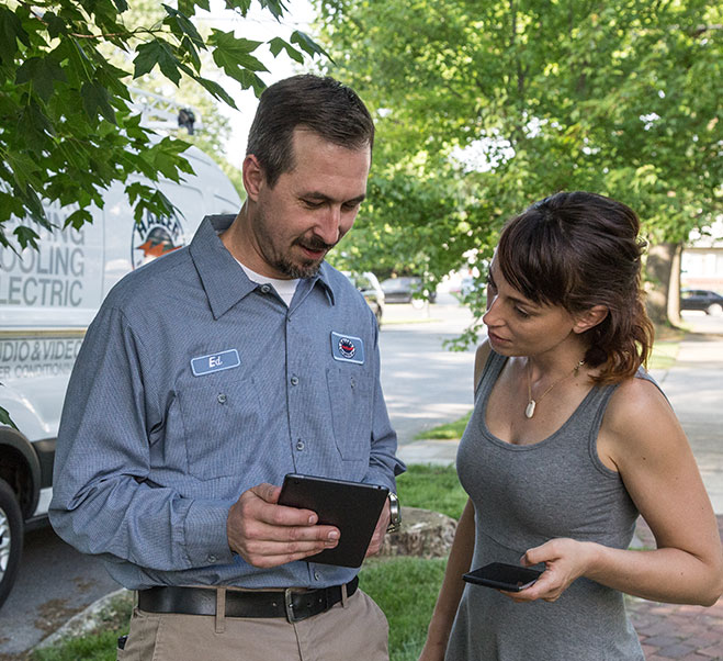 Haller Technician Helping customer with Memberships