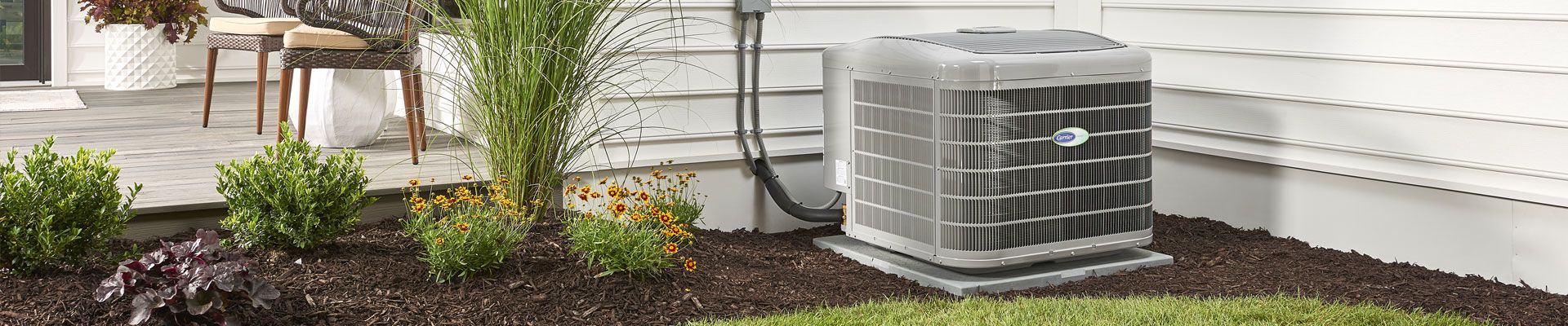 Carrier heating cooling unit outside in backyard