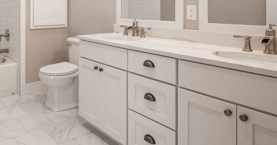 Bathroom with toilet and double sink