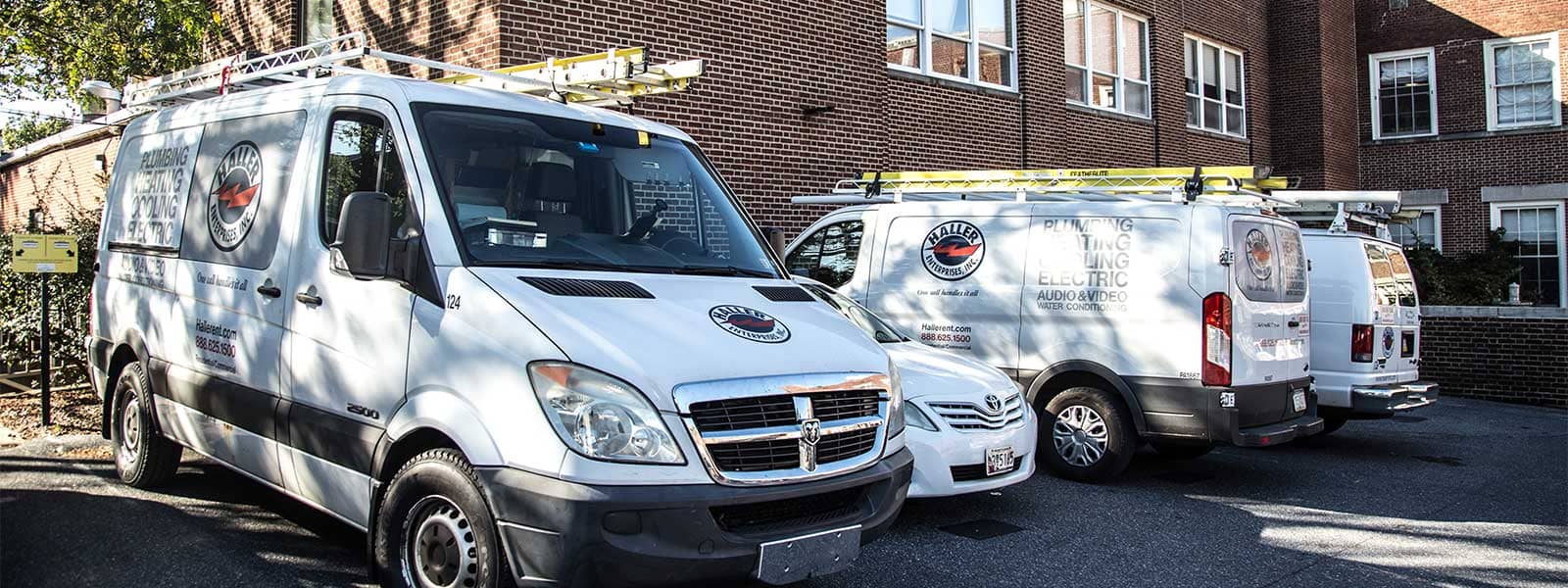 Haller trucks parked by library