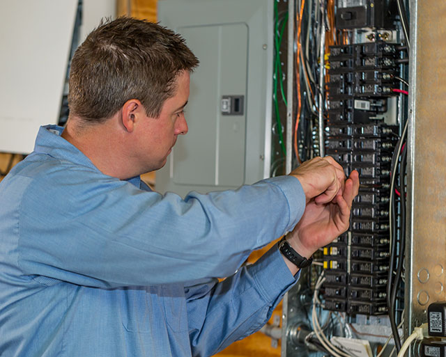 Haller technician installing a panel