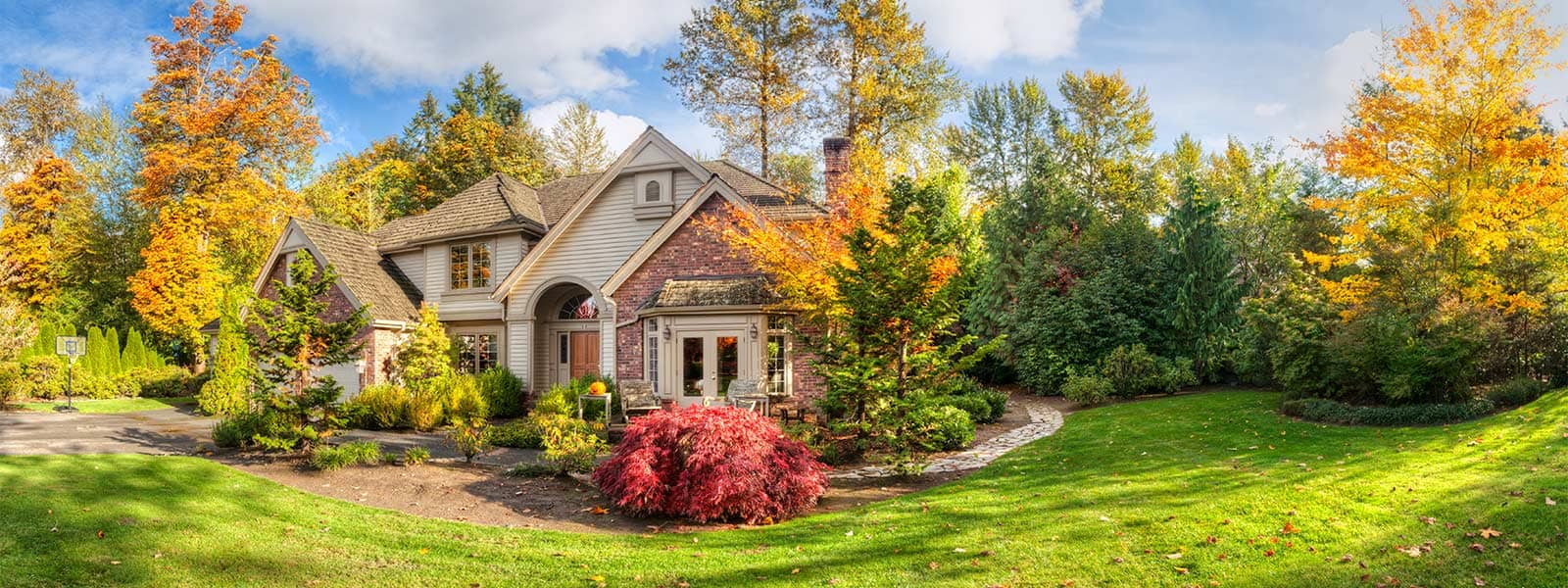 Beautiful house with fall foliage