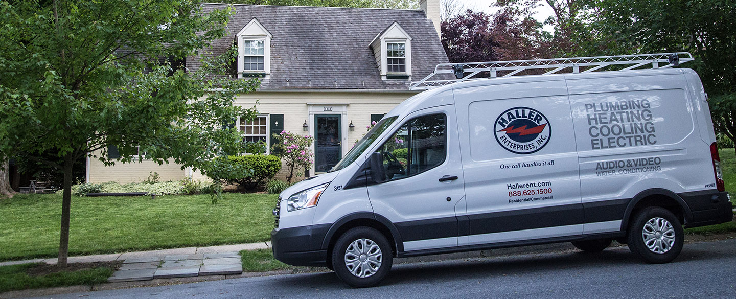 Haller heating and cooling van in front of home